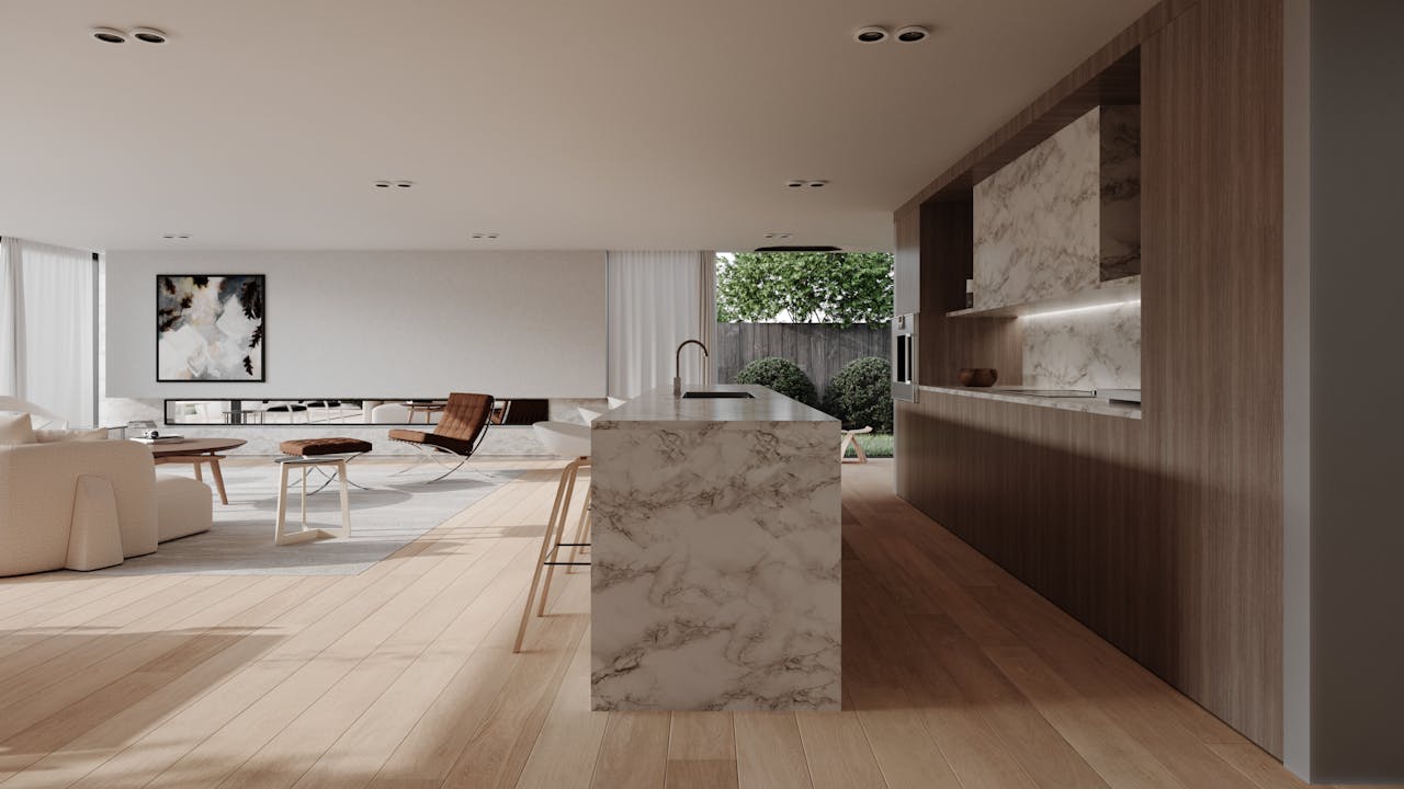 gallery-1 Stylish modern kitchen and living room with marble countertops and open design.
